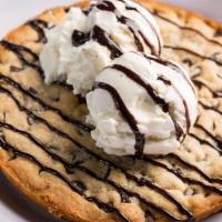 Deep Dish Cookie · A chocolate chip cookie made in a deep dish pan served with vanilla ice cream. 1160 cal.