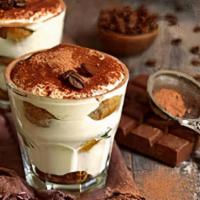Tiramisú Experience · savoiardi/ladyfingers soaked in coffee, arranged in layers and filled with a cream made with...