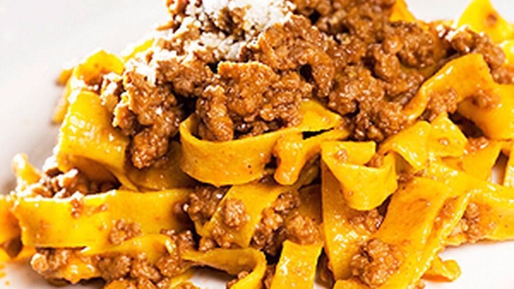 Bolognese · Tagliatelle pasta sautéed with our very traditional bolognese-style meat sauce and Parmigiano cheese.