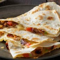 Grilled Quesadilla · Your choice of protein, flavorful salsas, sauces and toppings, served in a flour or whole wh...