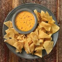 Chips & Queso · PopularOur signature 3-Cheese Queso, served with freshly fried in-house tortilla chips. item.