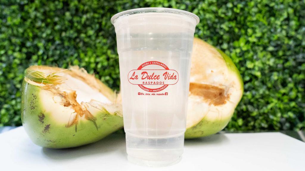 Coconut Water · 100% natural water, extracted from the coconut. No preservatives or additives.
