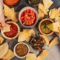 Chips & Salsa · Side cup of salsa not enough? Get a big cup of any of our homemade salsas with fresh tortill...