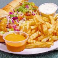 Key West Shrimp Poboy · loaded with  jumbo shrimp ,breaded and fried to perfection , homemade tartar sauce
topped wi...
