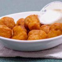 Fried Mushrooms · 10 large piece fried mushrooms breaded and well fried to gold.
seasoning and served with you...