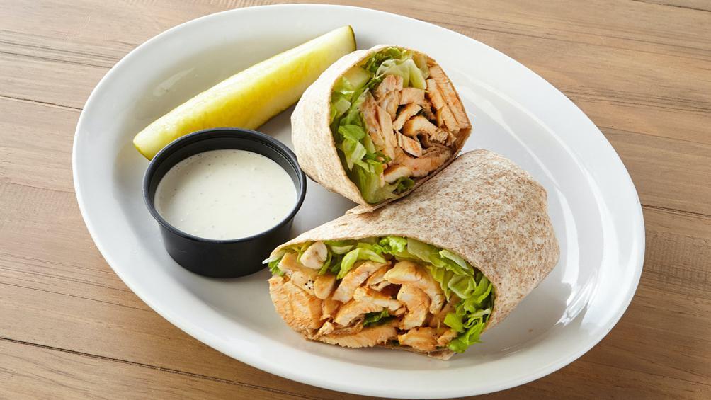 Buffalo Chicken Wrap · A johnny Brusco's favorite. Grilled chicken, mozzarella, signature hot sauce and lettuce. Served with ranch (170 cal.) or bleu cheese (190 cal.) on the side. 640 cal.