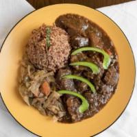 Stew Beef · Stew Beef cook with Carrots, potatoes, bell peppers, and onions. Served with Rice and peas, ...