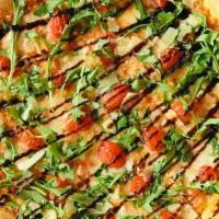 Pizzaiola · Tomato sauce, mozzarella, fresh tomato, garlic, arugula, shaved parmesan, balsamic glazer.
