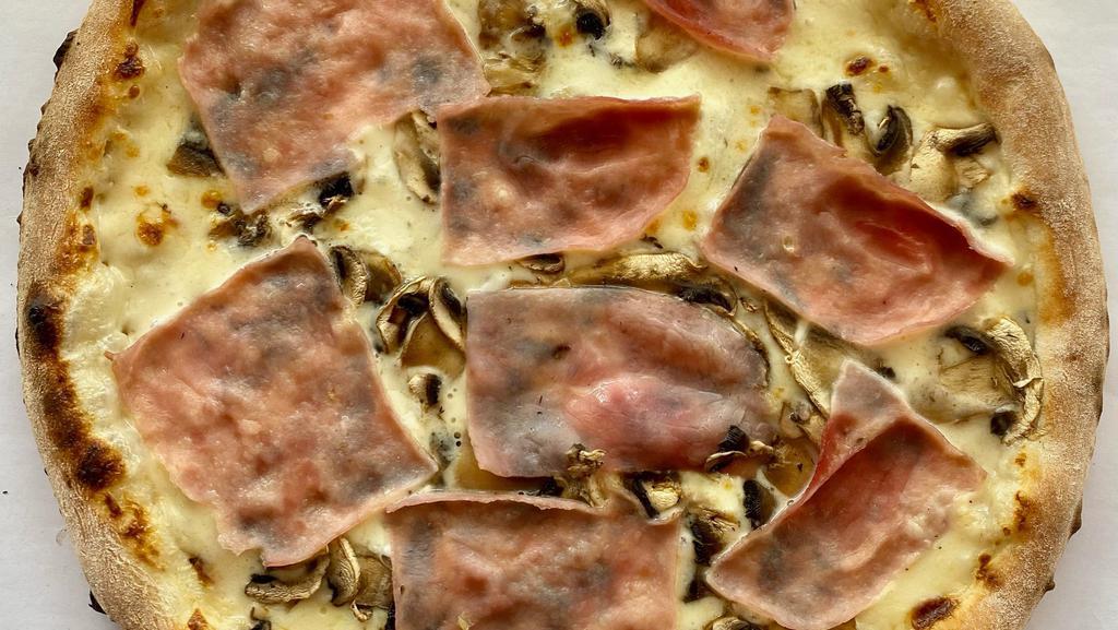 White Truffle Pizza · White sauce, mozzarella, ham, mushroom, and white truffle oil.