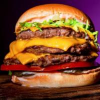 Signature Triple Burger · Triple 4 oz. Beef Patties, Grilled Onions, 3 slices of American Cheese, Classic Sauce, Pickl...