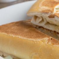 Tostada Cubana (Cuban Toast) · Pressed Toasted Cuban Bread with Butter, Cheese Optional