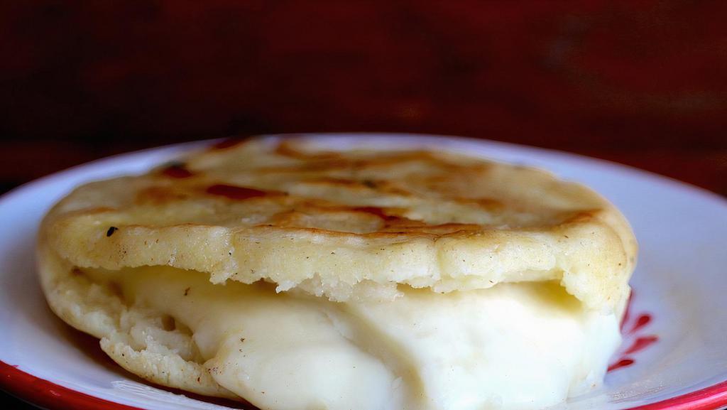 Guayanés Arepa · Corn arepa filled with fresh white cheese Guayanés or queso de mano.