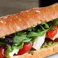 Capresse Sandwich · Fresh white cheese, tomato, oregano, and olive oil.