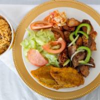 Griot (Fried Pork) · Poulet Chic favorite: Fried pork served with rice of the day, plantains and salad. Also come...