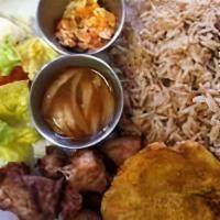 Dinde (Fried Turkey) · Served with white rice and bean sauce or diri kole (rice of the day)
fried or boiled plantai...