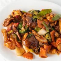 Happy Family · Pork, chicken, beef, shrimp and imitation crabmeat sautéed with vegetables in tasty brown sa...