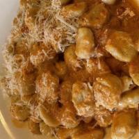 Potato Gnocchi · Wild mushrooms, Italian sausage, Demi-glace sauce Served with a small house or Caesar salad.
