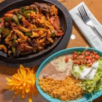 Fajitas · Chicken, bell peppers, onions and tomatoes. Served with rice, beans and salad. Steak or Mix(...