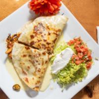 Quesadilla Hawaiiana · A 10-inch flour tortilla, stuffed with chicken, grilled pineapple, onions, mushrooms and jal...