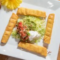 Taquitos Mexicanos · Four rolled tortillas, deep fried to a golden brown, stuffed with chicken or beef. Served wi...