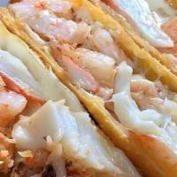 All Seafood Deluxe Eggroll · Shrimp, crab, lobster, and fresh cheese. Add French Fries for an additional charge.