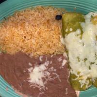 Enchiladas Verdes · Two chicken or beef enchiladas topped with our special green sauce and cheese. Served with r...