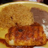 Lunch Chimichangas · Two fried flour tortillas, filled up with shredded chicken or ground beef, served with lettu...