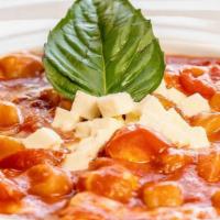 Gnocchi · Ricotta Cheese Gnocchi served with Fresh Mozzarella, Cherry Tomatoes and Basil