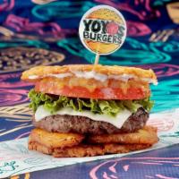 Honolulu Melt · Tostone buns, 6 oz Angus beef patty, Lettuce, Tomatoes, Platano maduro slices, Grilled pinea...