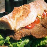 Chicken Milanesa Sandwich · Breaded Chicken, Lettuce, Tomatoes with Basil Aioli