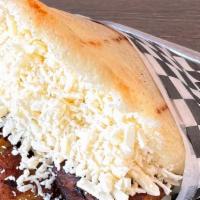 Arepa Platano Y Queso · Fried plantain and white shredded cheese.
