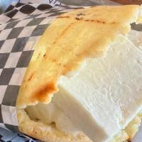Arepa Queso Guayanes · Arepa stuffed with Queso Guayanes; venezuelan creamy kind of cheese