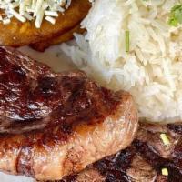Punta Trasera · Grilled Picanha steak served with two sides of your choice