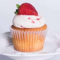 Strawberries & Cream · Strawberry Cream cheese frosting on our signature yellow  cake topped with a fresh strawberry.
