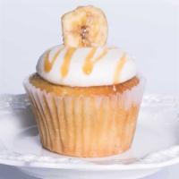 Banana Cream · Moist banana cake topped with creamy banana flavored Cream cheese frosting, drizzled in cara...