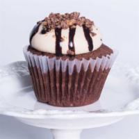 Chocolate Peanut Butter Cream · Our classic chocolate cake topped with yummy peanut butter Cream cheese frosting and topped ...