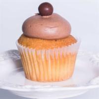 Classic Cami Chocolate · Our signature yellow cake with a classic chocolate buttercream frosting garnished with a cho...