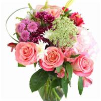 Cute Bloom Bouquet · Beautiful assortment of blooms arrange in a vase. Roses, hydrangeas, Lillys and delicate Que...