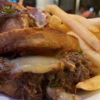 Short Rib Grilled Cheese · Super Slow Cooked Southern Flavored Beef Short Rib with Double Melted Swiss Cheese in a Butt...