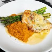 Parmesan Crusted Chicken · Marinated Chicken Breast finished with garlic butter and a parmesan topping served with choi...