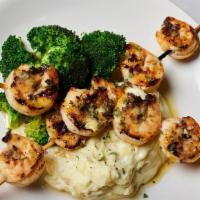 Grilled Shrimp Skewers 10 Piece · 10 jumbo shrimp flame grilled and finished with garlic butter.