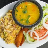 Arroz Con Pollo / Rice With Chicken · Pollo desmenuzado mezclado con arroz amarillo sazonado, verduras frescas, plátanos dulces, e...