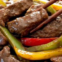 Pepper Steak · Served with egg drop and wonton soup or soda.