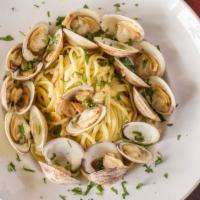 Linguini Con Vongole Verace · Fresh clams sautéed with EVOO, fresh garlic, and parsley. White or red.