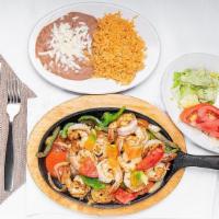 Grilled Shrimp · Grilled shrimp cooked with mixed vegetables, Mexican salad, rice, and three tortillas.