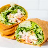 Hot & Spicy Wrap · Spicy. Strips of grilled chicken breast on a bed of Cheddar cheese with jalapeños, sour crea...