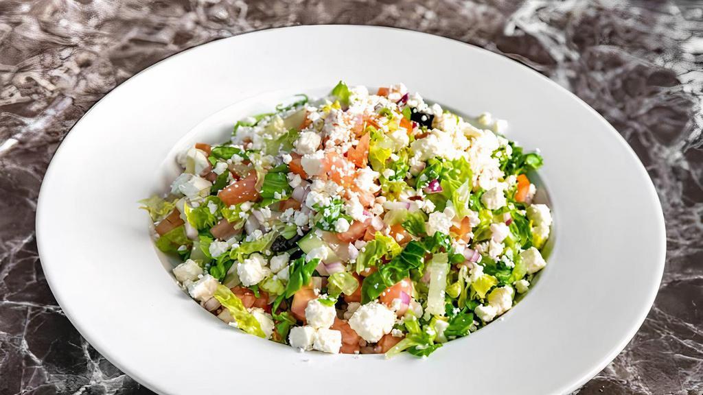 Greek Salad · Chopped salad with lettuce, tomatoes, Olives, Onions
Cucumber, Feta Cheese, olive oil vinegar & lemon juice