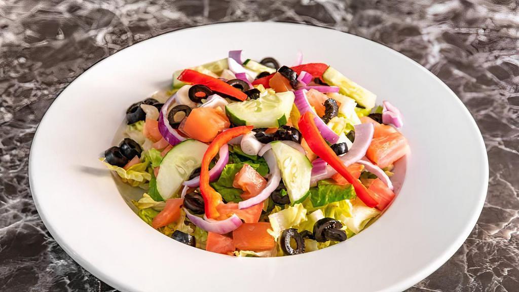 House Salad · Mix greens, green peppers, cucumbers, onion, olives, tomatoes. Dressing of your choice on the side