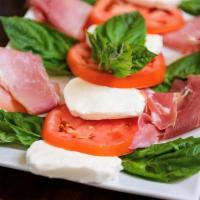 Caprese Salad · Fresh mozzarella, tomatoes, basil, balsamic, olive oil.