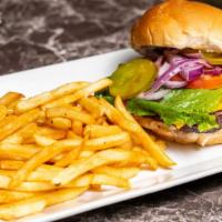 Classic Burger · 8 oz beef patty, French fries, lettuce, tomato, onion, pickles.